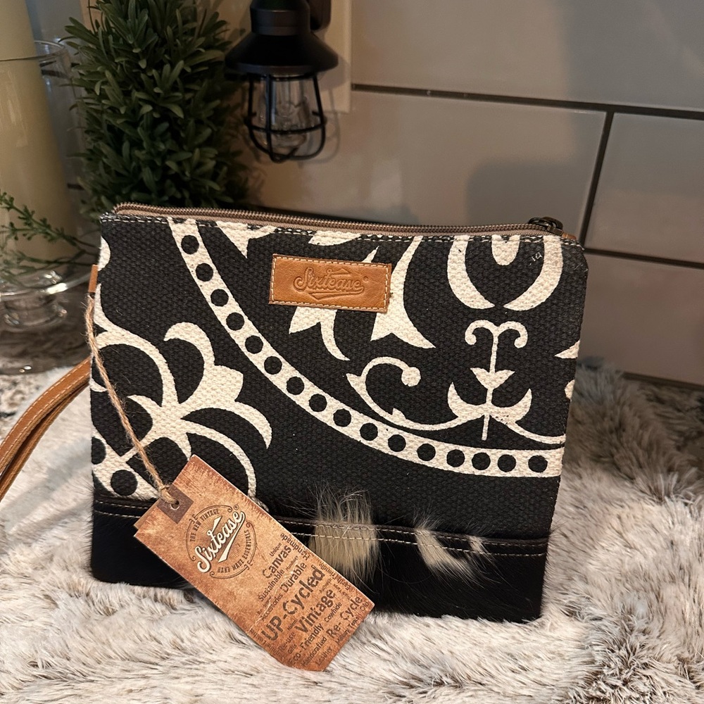 NWT Sixtease wristlet. Beautiful black, white & gray design.